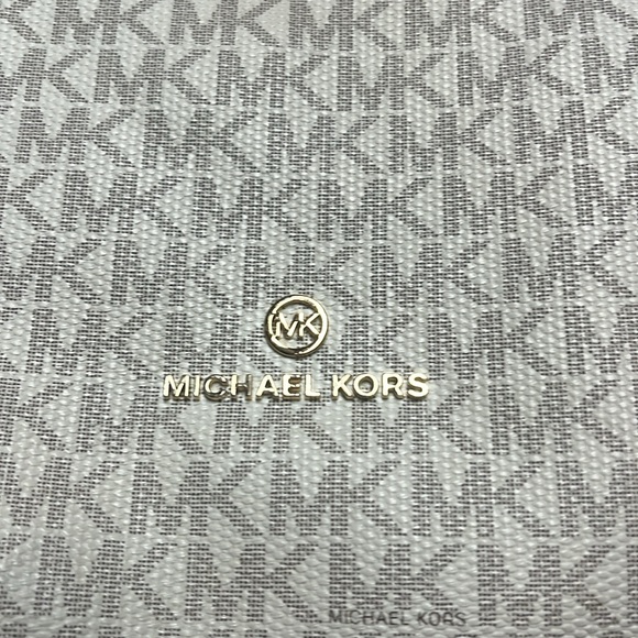 Michaell Kors signature shoulder bag- cream background with gray-ish MK’s. - Picture 10 of 16